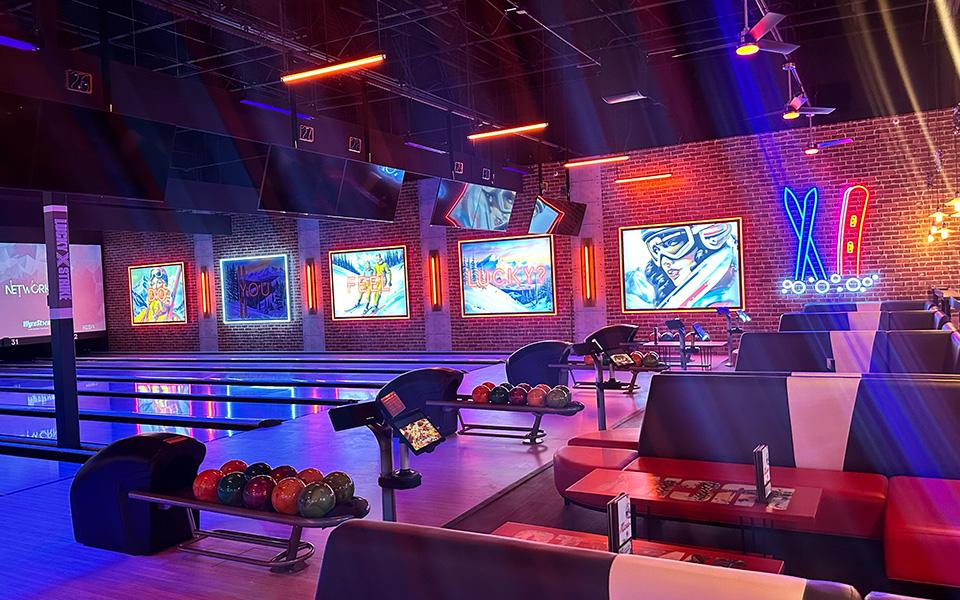 Beautiful bowling lanes lit in neon and blacklights