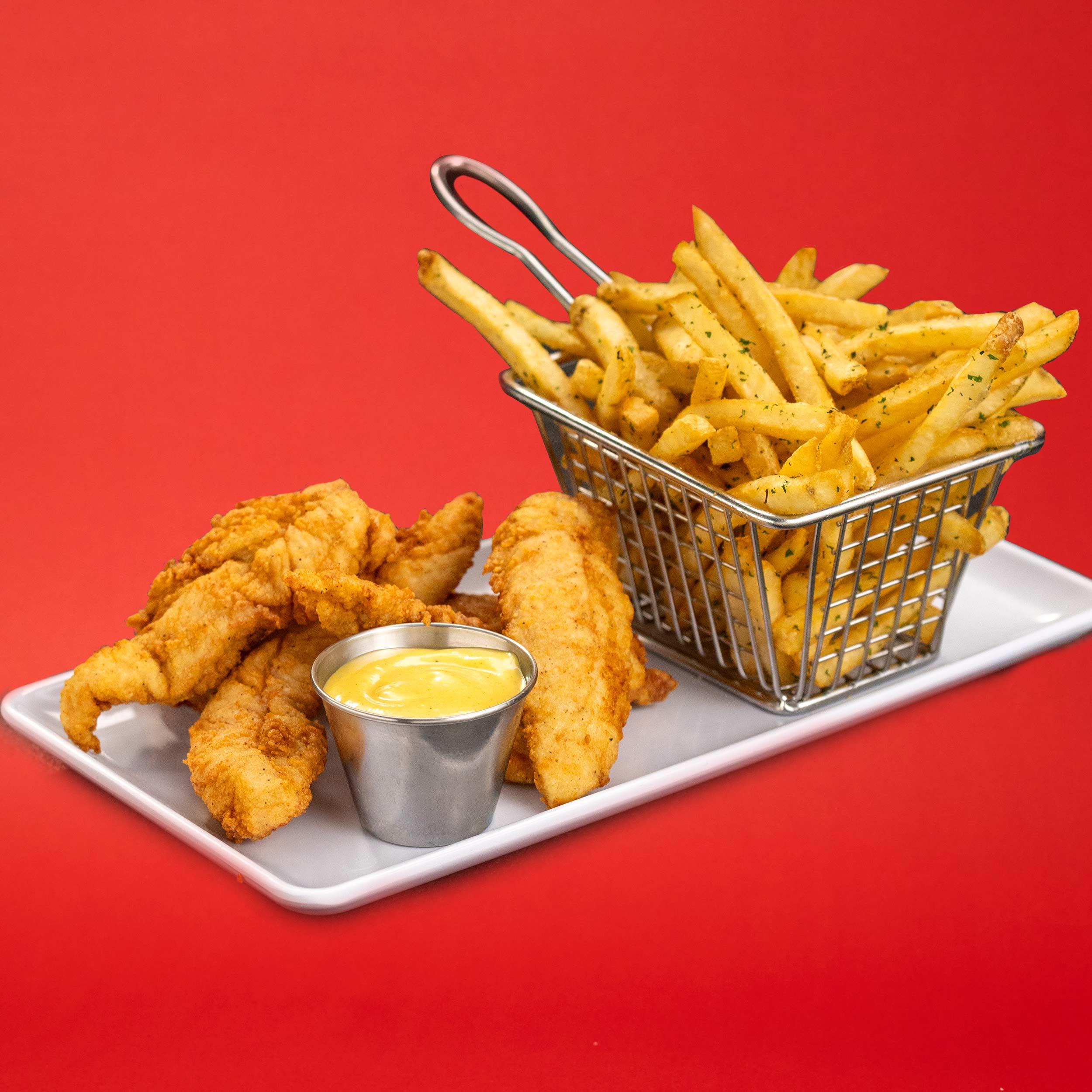 Delicious chicken tenders with fries