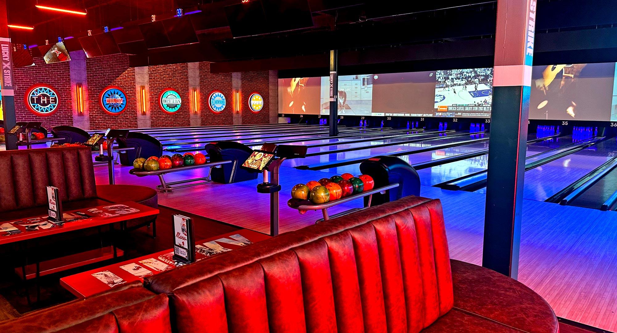 Beautiful bowling lanes with booths in the foreground