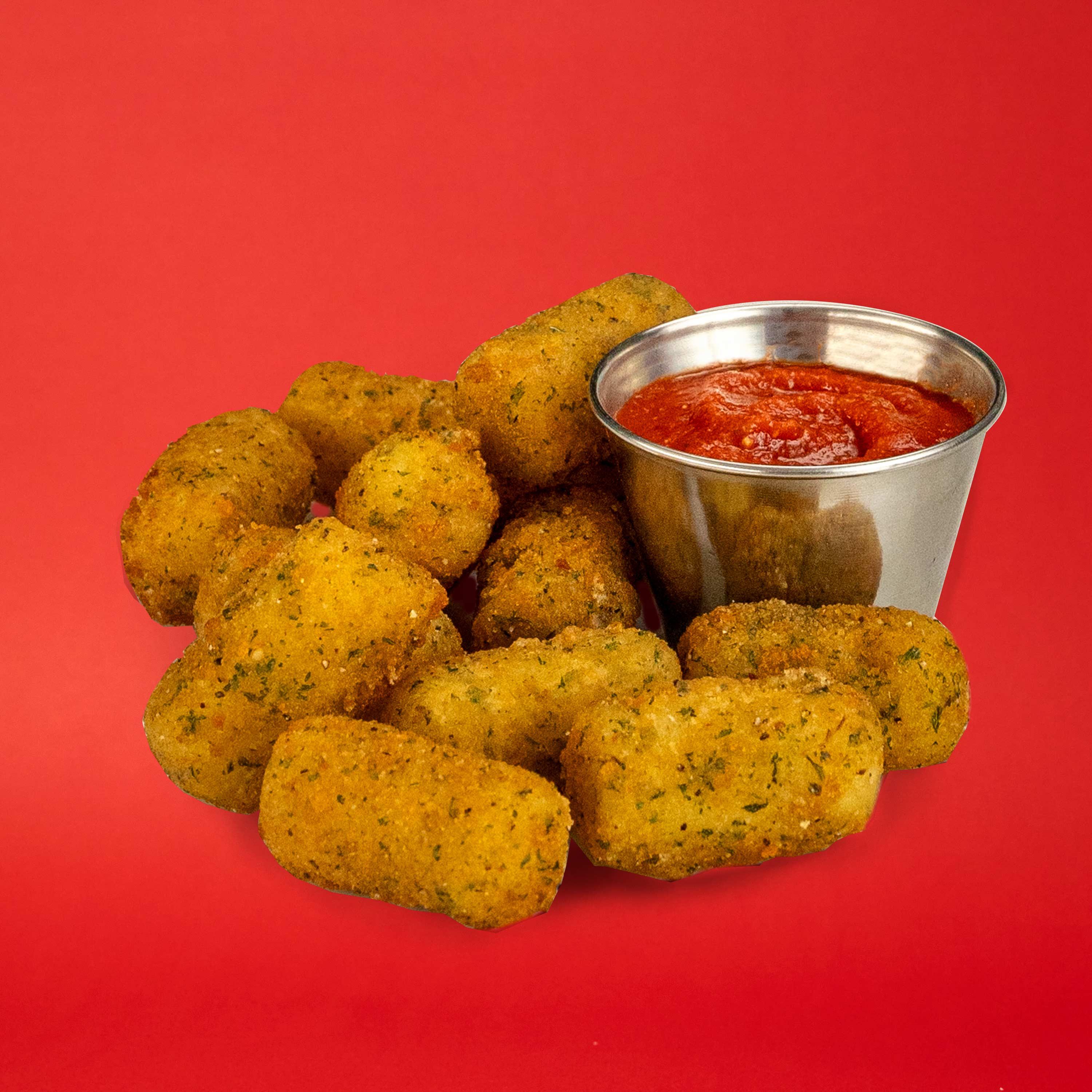 Hot and crispy mozzarella bites with marinara dipping sauce