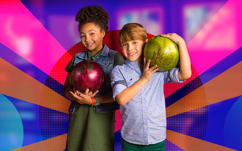 Young kids holding bowling balls with colorful background