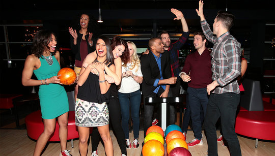 friends standing near bowl return and showing love and affection for each other